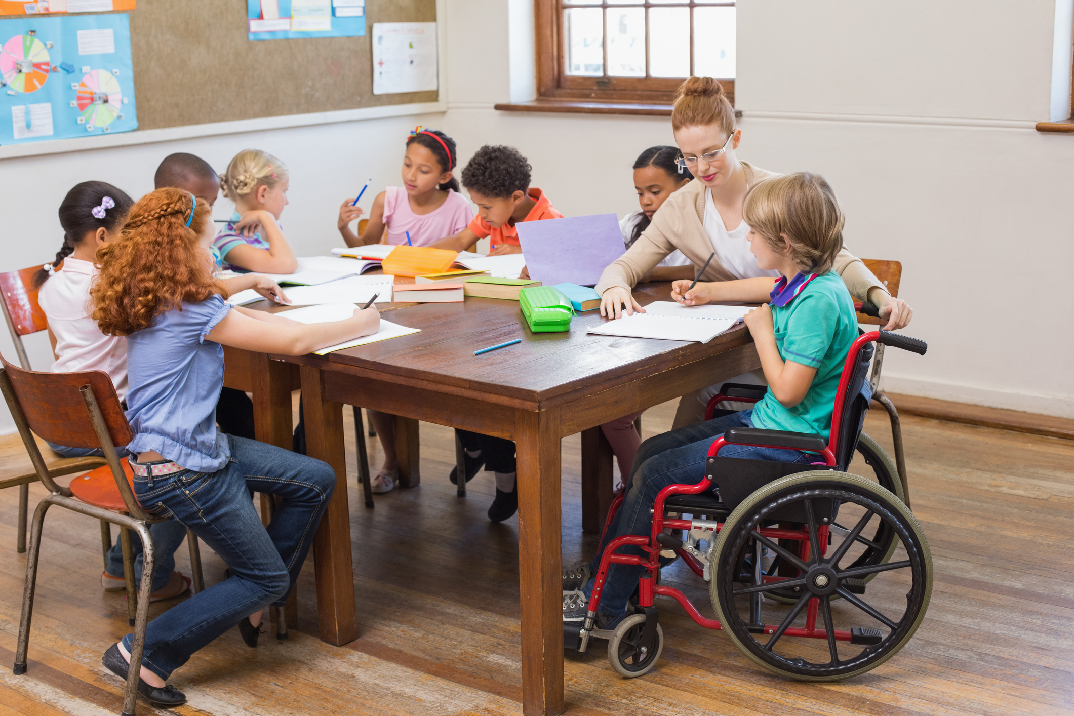 A classroom with a teacher and students